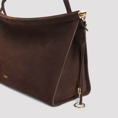 Alaïa Le Click East West Large Bag In Nubuck In Brown