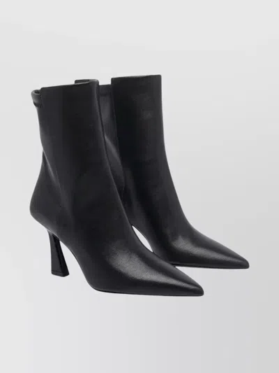Stuart Weitzman Pointed Toe Ankle Boots With Sculpted Mid-height Heel In Black