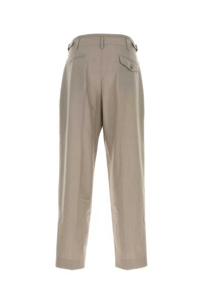 Lemaire Tailored Cropped Trousers Featuring Pleats In Neutral