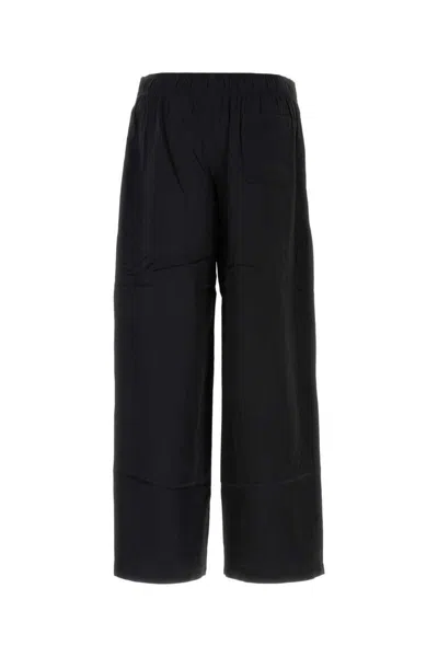 Our Legacy Tailored Black Trousers With Pleated Front And Minimalist Design In Black