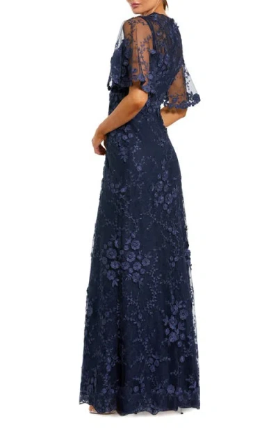 Mac Duggal Flutter Sleeve Floral Emboridered Net Gown In Blue