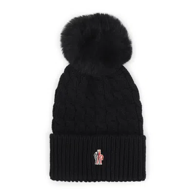Moncler Wool Hat Featuring Cable Knit And Pom Detail In Black