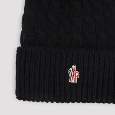 Moncler Wool Hat Featuring Cable Knit And Pom Detail In Black