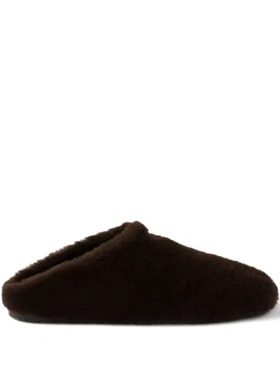 Prada Shearling Mules In Brown