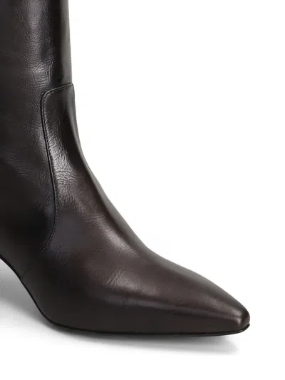 皮质尖头及膝靴