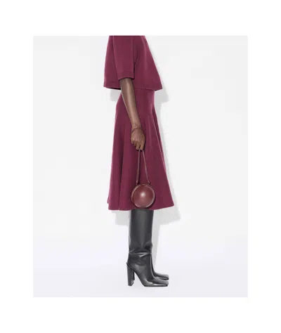 Alaïa Pleated Knitted Cashmere-blend Midi Skirt In Burgundy