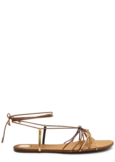 Saint Laurent Cassandre Leather Flat Strappy Sandals In Gold