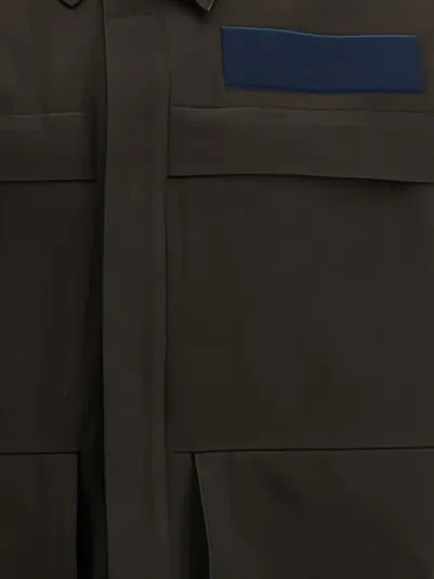 Gr10k Alpha Patch-pocket Cotton Shirt Jacket In Brown