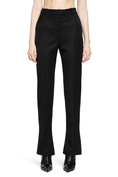 Alexander Mcqueen Tailored Wool Trousers Featuring Flared Hem In Black