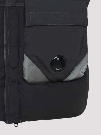 C.p. Company Black Vest With Mock Drawstring Neck And Logo Plaque On The Front In Black