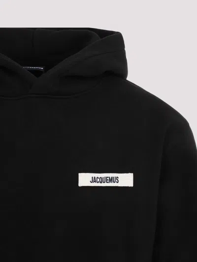 Jacquemus Hooded Long Sleeve Knitwear With Ribbed Cuffs In Black