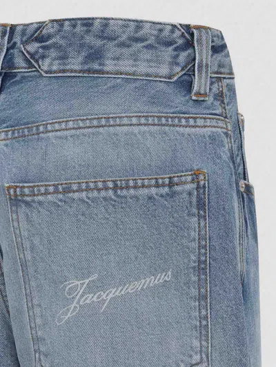 Jacquemus Wide Leg High Rise Jeans With Contrast Stitching In Blue