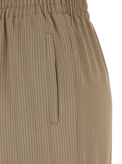 Golden Goose 'brittany' Beige Pants With Logo Charm Detail On The Rear And All-over Striped Motif In Viscose Blen In Brown