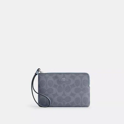 Coach Corner Zip Wristlet In Signature Canvas In Blue