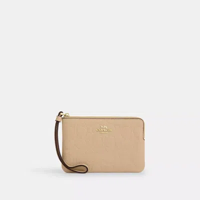 Coach Corner Zip Wristlet In Signature Leather In Sand