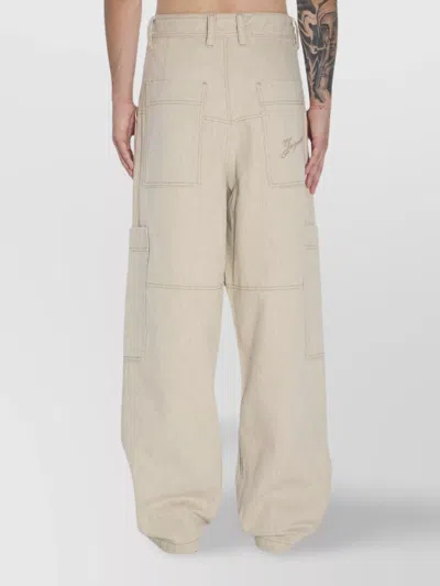 Jacquemus Relaxed Wide-leg Beige Jeans With Utility Pockets In Neutral