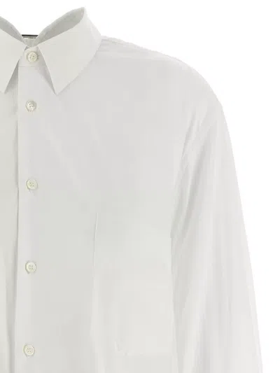 Comme Des Garçons Asymmetric Hem Shirt With Front Button Closure And Unique Silhouette In White