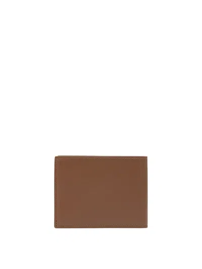 Ferragamo Compact Brown Wallet With Minimalist Design And Subtle Stitching In Brown