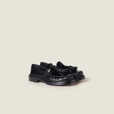 Miu Miu Tassel Loafers In Polished Leather In Black