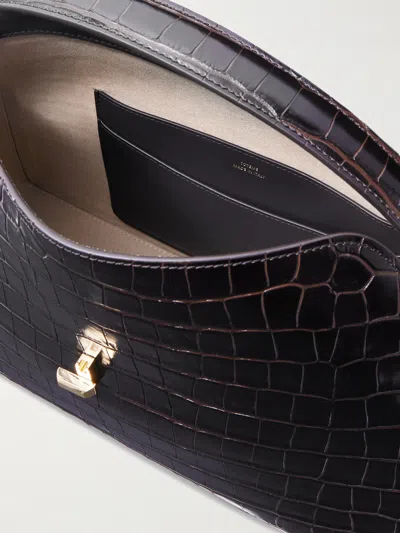 Totême Leather Handbag Featuring Adjustable Strap In Black