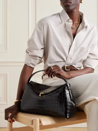 Totême Leather Handbag Featuring Adjustable Strap In Black