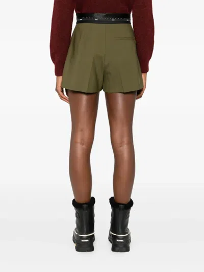 Msgm Pleated-panel Ribbon-trimmed Shorts In Green