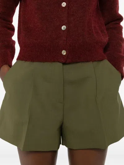 Msgm Pleated-panel Ribbon-trimmed Shorts In Green