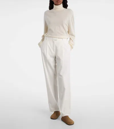 The Row Lizzy Cashmere Turtleneck Sweater In Gold