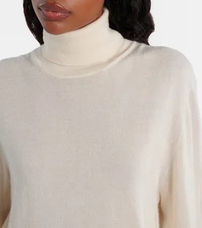 The Row Lizzy Cashmere Turtleneck Sweater In Gold