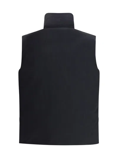 Laminar Padded And Quilted Sleeveless Jacket In Black