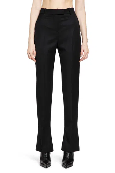 Alexander Mcqueen Tailored Wool Trousers Featuring Flared Hem In Black