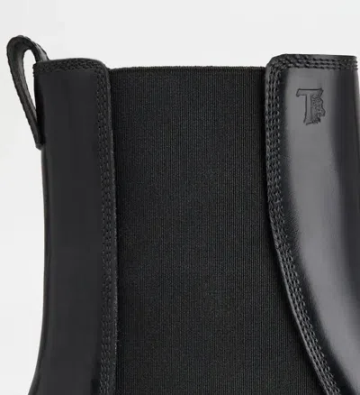 Tod's Black Leather Ankle Boots With Elastic Panels In Black