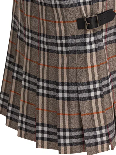 Burberry Plaid Pleated Skirt With Frayed Hem And Buckle Accents In Brown