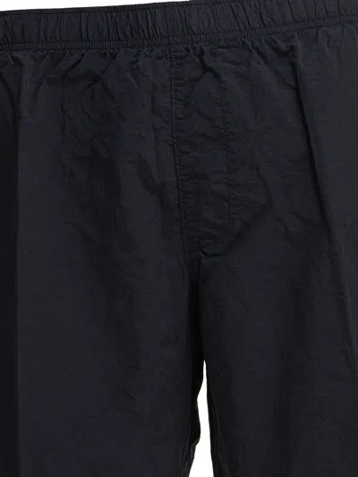 C.p. Company Black Minimalist Beach Shorts With Unique Lens Detail In Blue