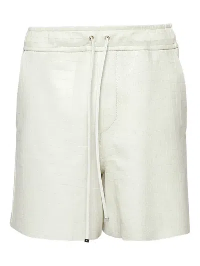 Amiri Embossed Crocodile Shorts In Green