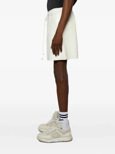 Amiri Embossed Crocodile Shorts In Green