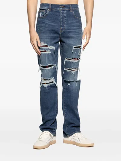 Amiri Distressed-effect Jeans In Blue