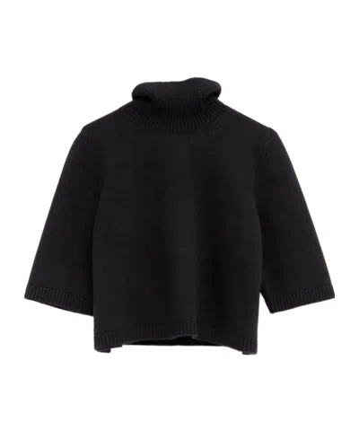 Alaïa Cropped Cashmere-blend Turtleneck Sweater In Black