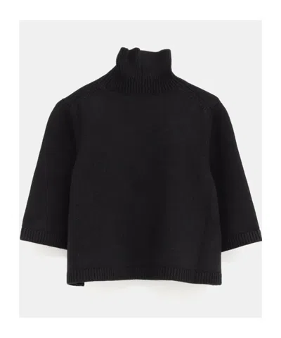 Alaïa Cropped Cashmere-blend Turtleneck Sweater In Black