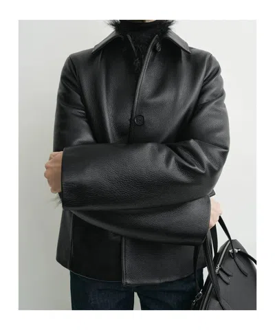 Totême Paneled Textured-leather Jacket In Black