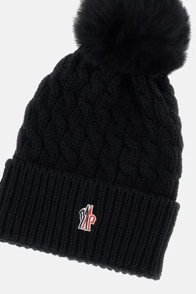 Moncler Wool Hat Featuring Cable Knit And Pom Detail In Black