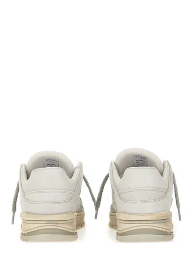 Axel Arigato Area Lo Perforated Leather Sneakers In Animal Print
