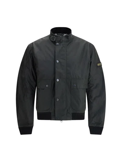 Barbour International Traction Waxed Button-fastening Flap-pocket Jacket In Black