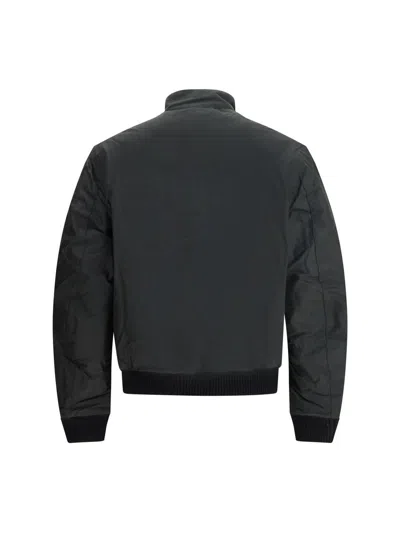 Barbour International Traction Waxed Button-fastening Flap-pocket Jacket In Black