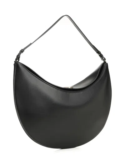 Jacquemus Le Petit Calisso Rond Embellished Leather Clutch In Black
