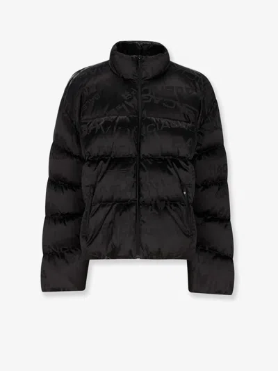 Balenciaga Men Nylon Down Jacket With All-over Lettering Logo In Black