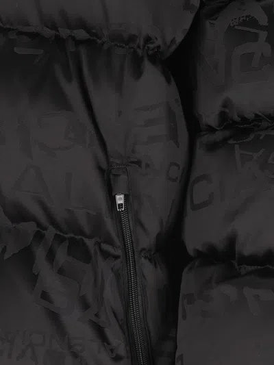 Balenciaga Men Nylon Down Jacket With All-over Lettering Logo In Black