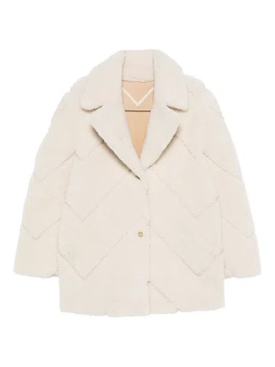 人字纹图案皮毛一体夹克