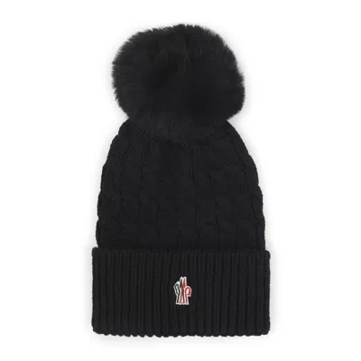 Moncler Wool Hat Featuring Cable Knit And Pom Detail In Black