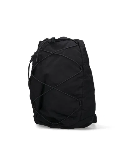 C.p. Company One-shoulder Logo Backpack In Black